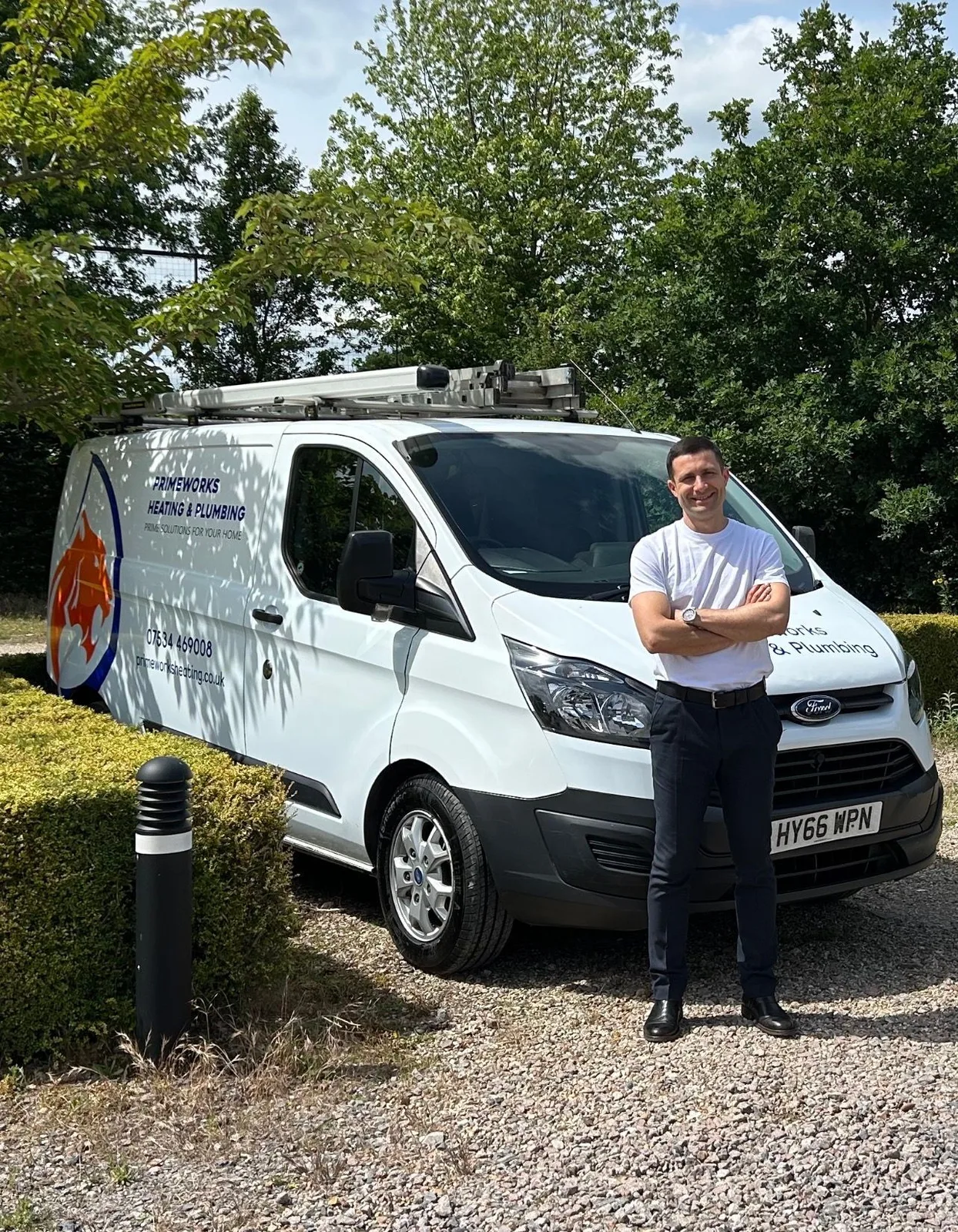 Nick Vrabiescu, owner of Primeworks Heating & Plumbing, with the company van in South-East London