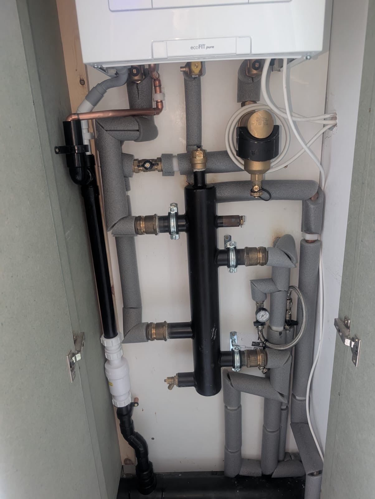 System boiler pipework and low loss header on a Greenwich heating installation